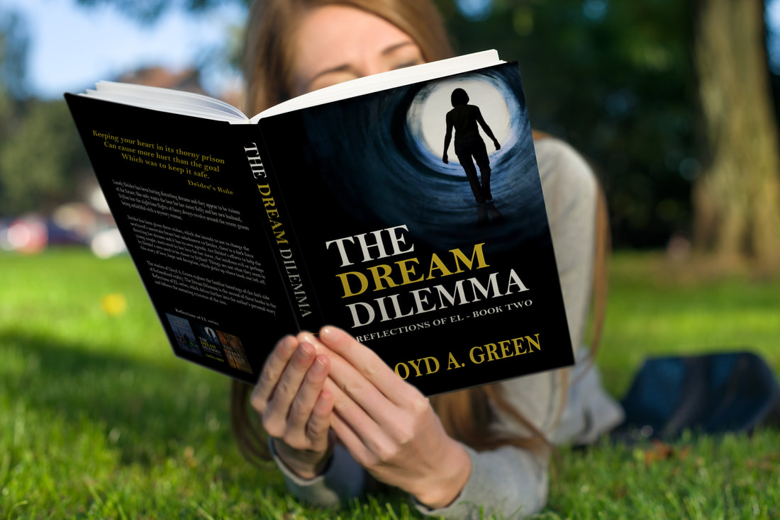 Cannot be controlled. Woman lying in grass reading book