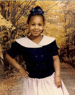 Danielle age five sassy in black and pink dress