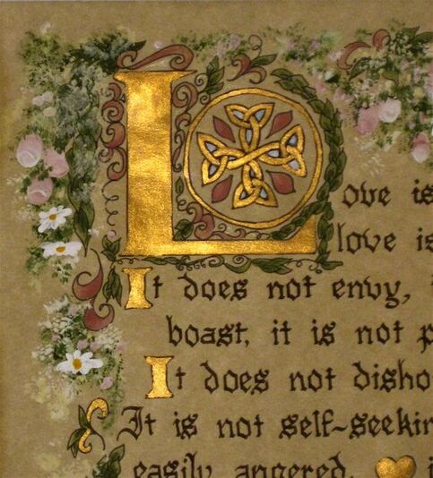 Corner of page with gold leaf lettering