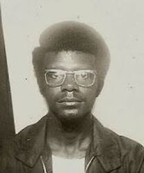 Lloyd age 15 metal rimmed glasses and jacket