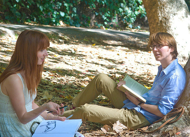 Ruby Sparks talking to Calvin with back against tree