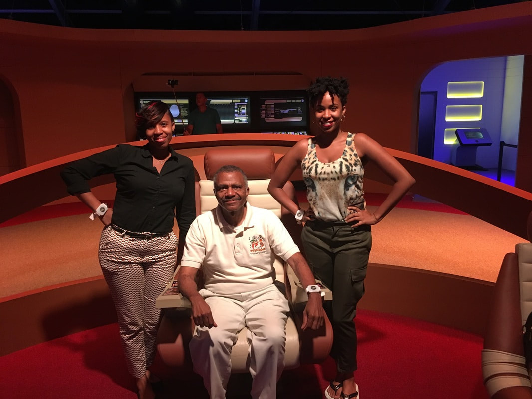 three-star-fleet-cadets-on-the-bridge-of-the-enterprise-d