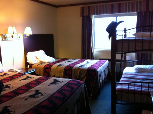 two beds and a bunkbed