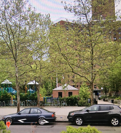 view of 70 Lenox Avenue through trees 2019