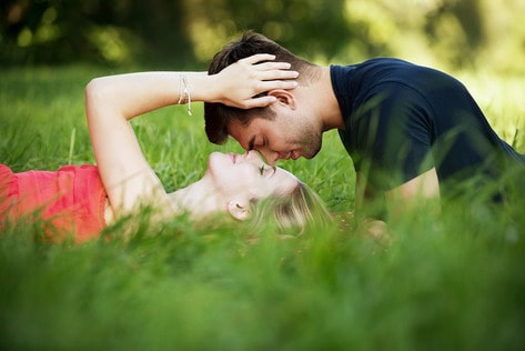 woman-lying-in-grass-enticing-a-married-man